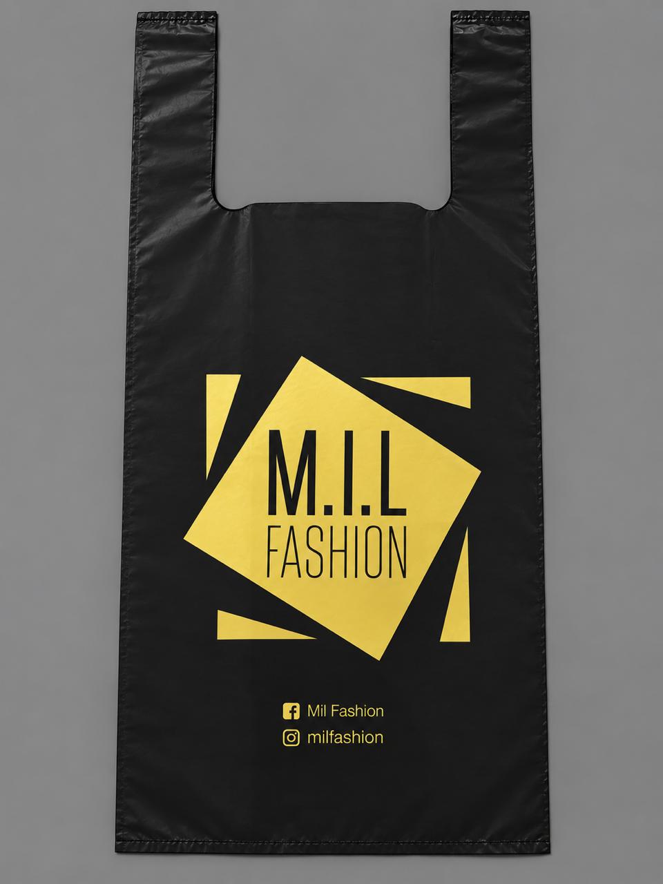 Sacola Alça Camiseta com imp em dourado com fundo preto.